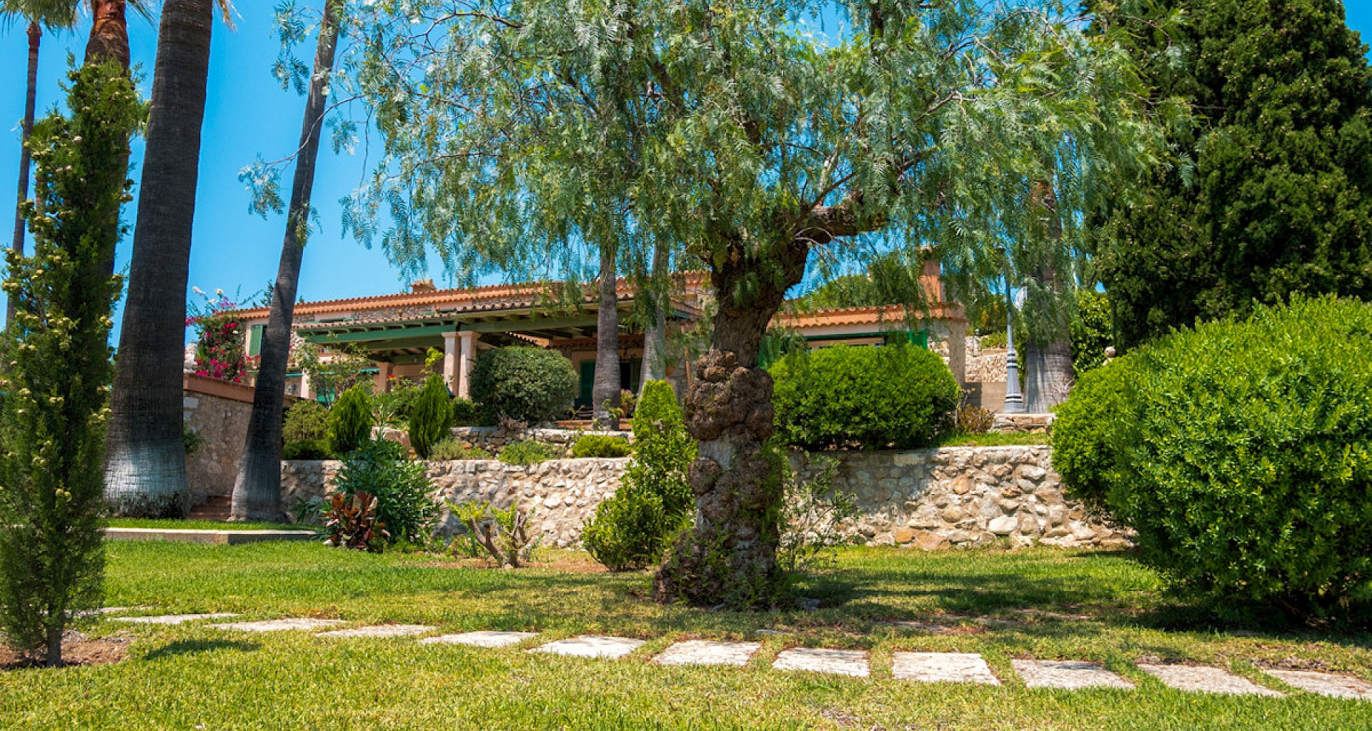 KROHN & LUEDEMANN Mediterranean Finca with guesthouse and panoramic views in Es Capdella 17 Garden 2 + Building - Finca Es Capdella